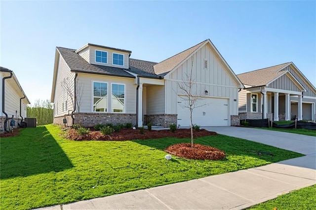 1682 Juniper Berry Way, Loganville, GA 30052 - craftsman-style home with board and batten siding, driveway, a garage, a front lawn, and brick siding