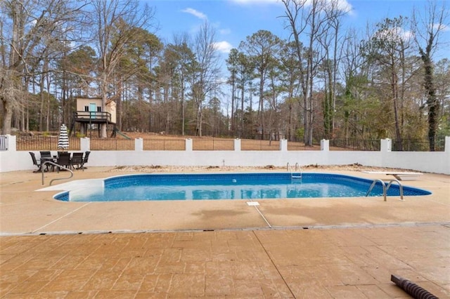 view of pool with stairs, a patio area, fence private yard, and a fenced in pool