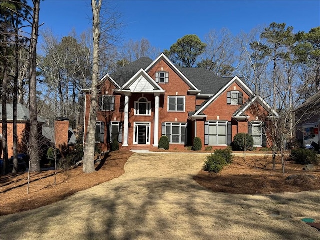 view of front of home with brick siding