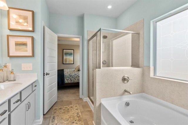 383 Morgan Rd, Carrollton, GA 30116 - full bathroom featuring a stall shower, a garden tub, vanity, and connected bathroom