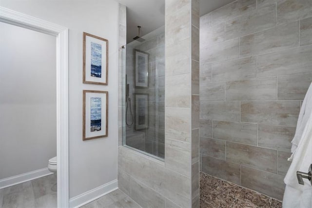 124 Everley Walk, Alpharetta, GA 30009 - bathroom with toilet, a walk in shower, and baseboards