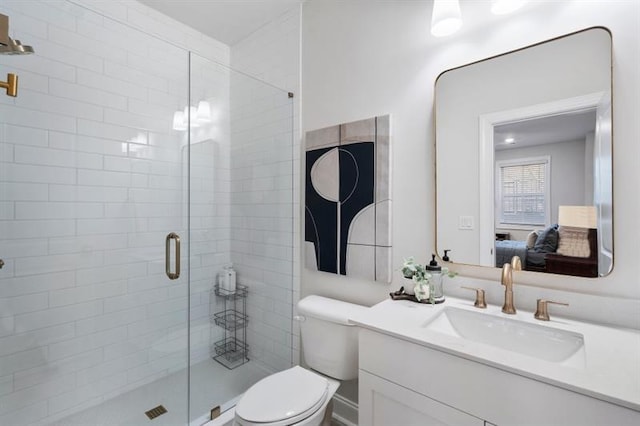 124 Everley Walk, Alpharetta, GA 30009 - bathroom featuring toilet, vanity, a stall shower, and ensuite bathroom