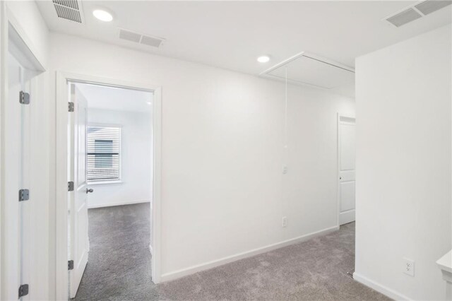 348 White Tail Rd, Stockbridge, GA 30253 - empty room featuring attic access, visible vents, and carpet flooring