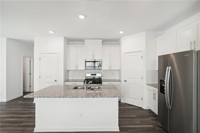 348 White Tail Rd, Stockbridge, GA 30253 - kitchen with white cabinetry, a sink, and appliances with stainless steel finishes