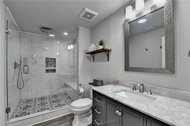 1595 Northcliff Trce, Roswell, GA 30076 - full bathroom with toilet, vanity, a shower stall, and wood finished floors