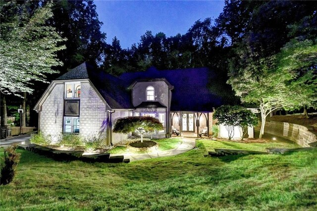 1595 Northcliff Trce, Roswell, GA 30076 - rear view of house featuring a chimney, a wooden deck, a patio area, and stucco siding