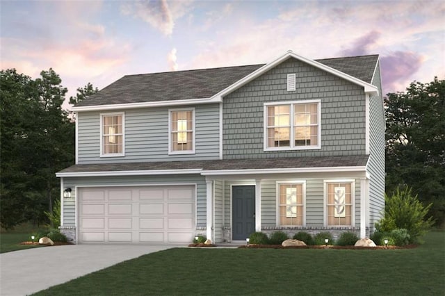 144 Pinehurst Ct, Dublin, GA 31021 - view of front of home with driveway, a lawn, a garage, and a shingled roof