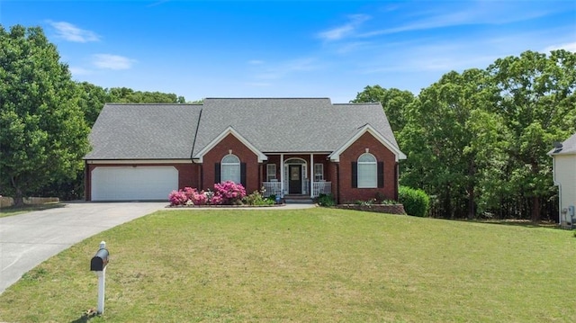 20 Friendship Rd, Euharlee, GA 30145 - view of front of home with a garage, driveway, covered porch, a front yard, and brick siding