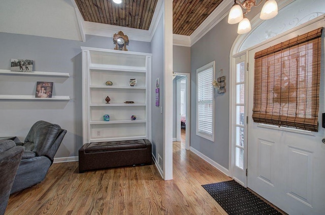 20 Friendship Rd, Euharlee, GA 30145 - foyer entrance with crown molding, wood finished floors, and a chandelier