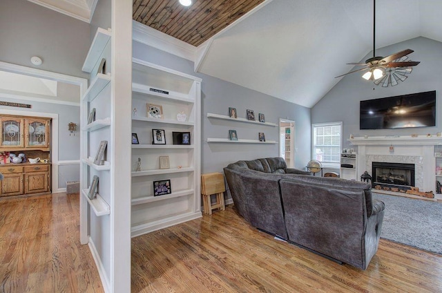 20 Friendship Rd, Euharlee, GA 30145 - living area featuring ceiling fan, a high end fireplace, vaulted ceiling, wood finished floors, and crown molding