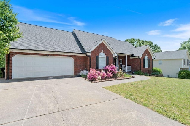 20 Friendship Rd, Euharlee, GA 30145 - view of front of home featuring brick siding, concrete driveway, a front yard, and an attached garage