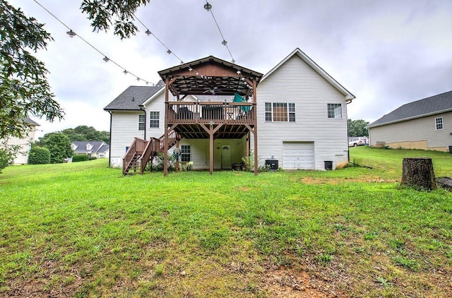 20 Friendship Rd, Euharlee, GA 30145 - back of house with stairs, a deck, a yard, and an attached garage