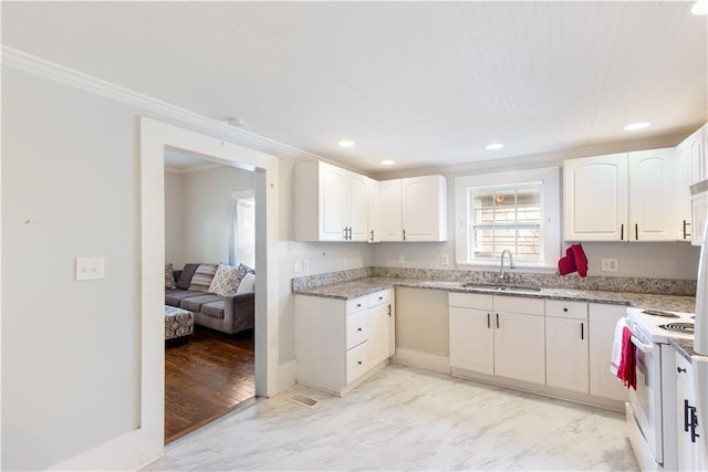 1087 Longley Ave NW, Atlanta, GA 30318 - kitchen with crown molding, white range with electric stovetop, white cabinets, light stone counters, and a sink