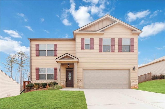 craftsman-style home featuring a garage and a front yard