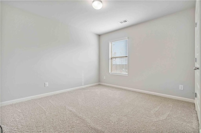 empty room featuring carpet