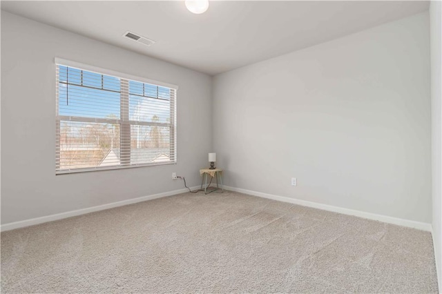 empty room featuring carpet floors