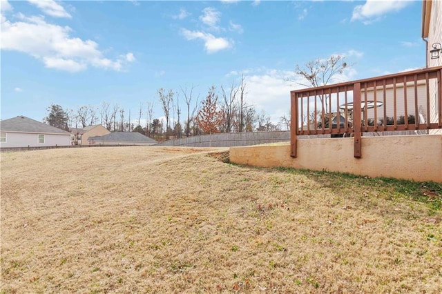 view of yard with a wooden deck