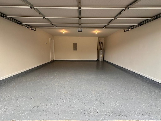 garage with a garage door opener, electric panel, and electric water heater