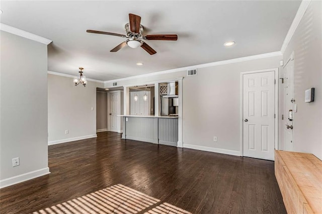 unfurnished living room with dark wood-style flooring, visible vents, crown molding, and baseboards