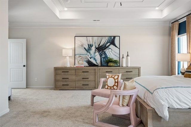 bedroom featuring carpet flooring, crown molding, and a raised ceiling