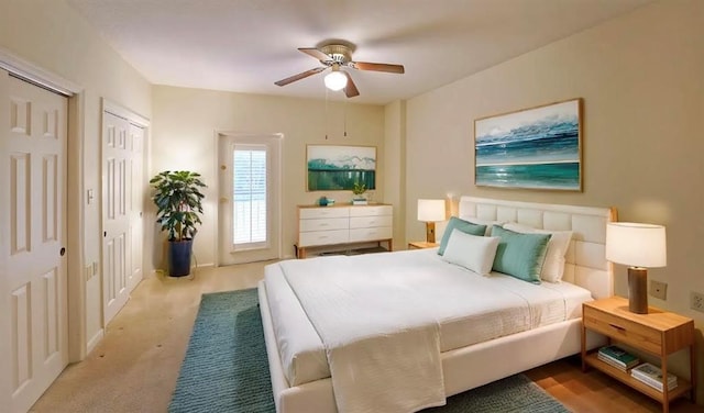 1800 Clairmont Lk Unit 213, Decatur, GA 30033 - carpeted bedroom with two closets and a ceiling fan