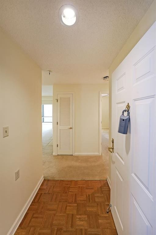 1800 Clairmont Lk Unit 213, Decatur, GA 30033 - hall featuring a textured ceiling and carpet floors