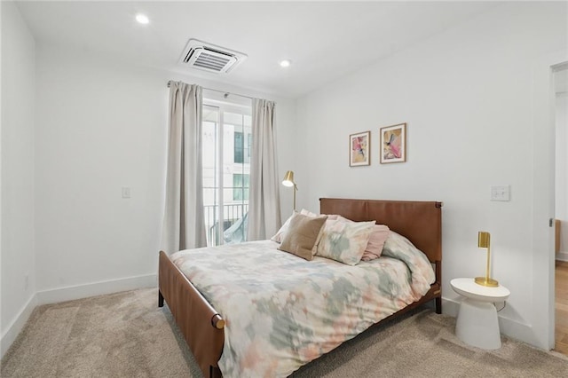 230 New St Unit 2102, Decatur, GA 30030 - bedroom featuring visible vents, recessed lighting, baseboards, and light carpet