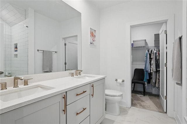 230 New St Unit 2102, Decatur, GA 30030 - full bathroom featuring double vanity, a sink, marble finish floor, and a stall shower