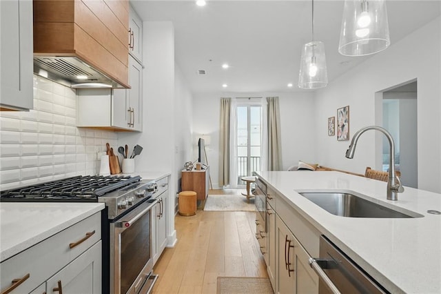 230 New St Unit 2102, Decatur, GA 30030 - kitchen featuring a sink, appliances with stainless steel finishes, hanging light fixtures, and recessed lighting