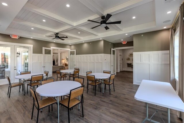 dining room with beamed ceiling, dark hardwood / wood-style flooring, french doors, and ceiling fan