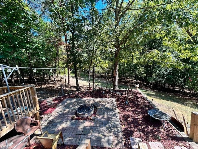 view of patio / terrace featuring a fire pit