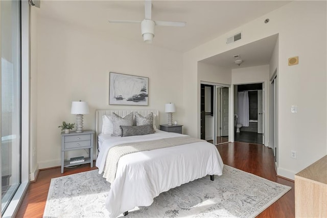 bedroom with hardwood / wood-style flooring and ceiling fan