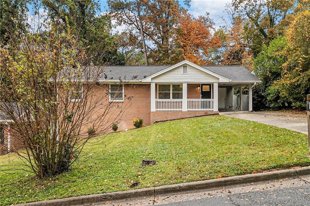 ranch-style home with a front yard and a carport