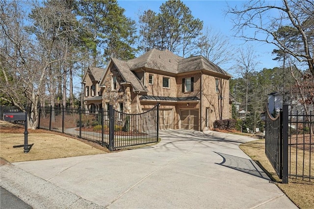 view of front of property with fence and driveway