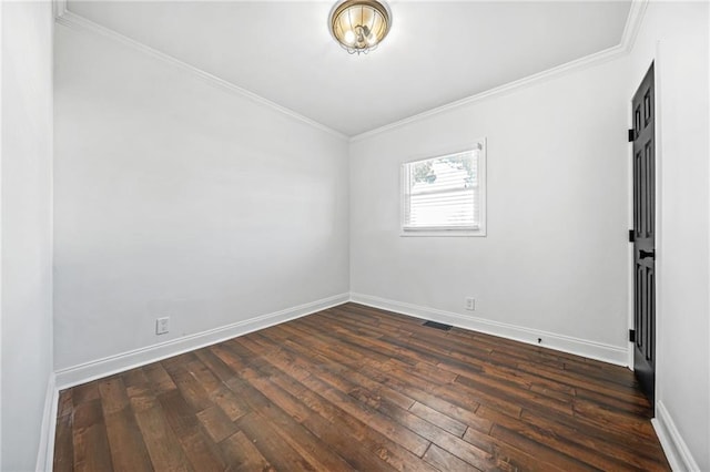 unfurnished room with dark wood-type flooring and ornamental molding