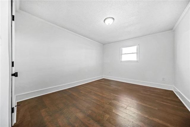 unfurnished room featuring a textured ceiling, dark hardwood / wood-style floors, and ornamental molding