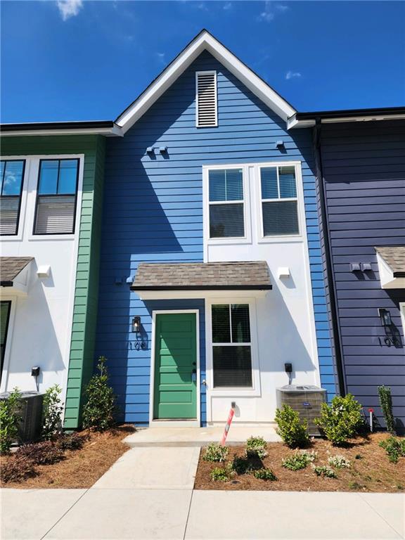 view of front of house featuring central AC unit