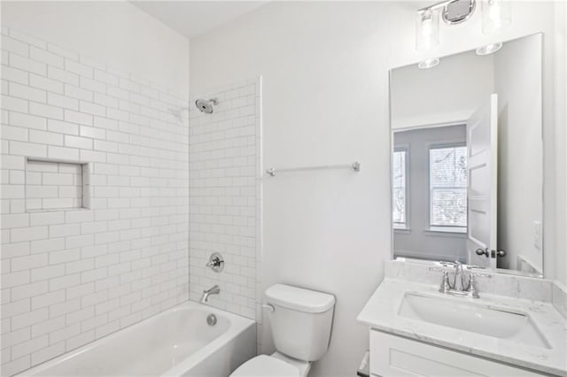 full bathroom featuring toilet, bathtub / shower combination, and vanity