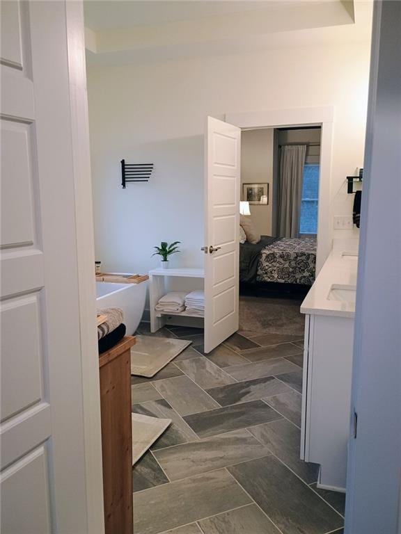 336 White Oak Way, Monroe, GA 30655 - ensuite bathroom with vanity and a bathtub