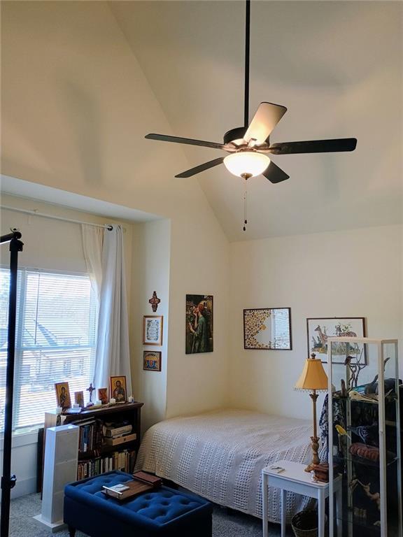 336 White Oak Way, Monroe, GA 30655 - bedroom featuring vaulted ceiling, carpet, and a ceiling fan