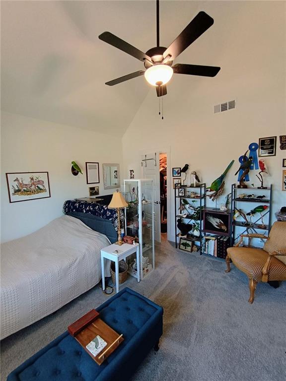 336 White Oak Way, Monroe, GA 30655 - bedroom with carpet flooring, high vaulted ceiling, and a ceiling fan