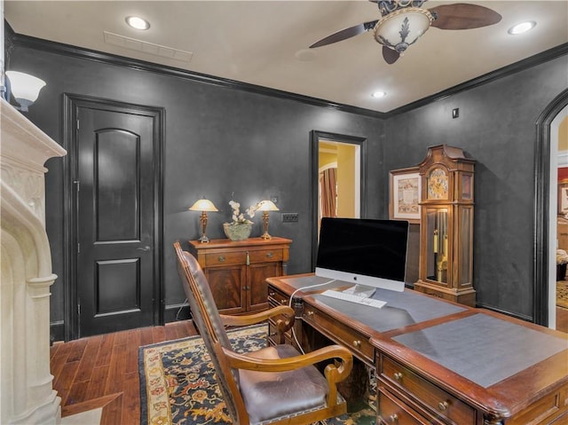 office space with a ceiling fan, wood finished floors, and crown molding