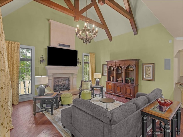 living area with high vaulted ceiling, beamed ceiling, wood finished floors, and a premium fireplace