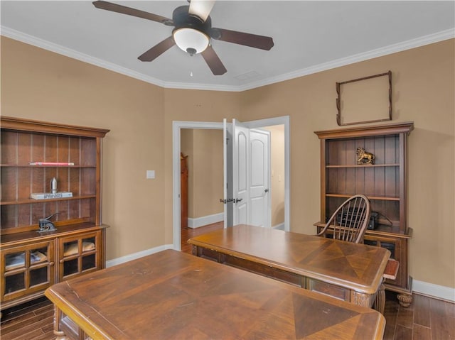 home office with dark wood-style floors, baseboards, and ornamental molding