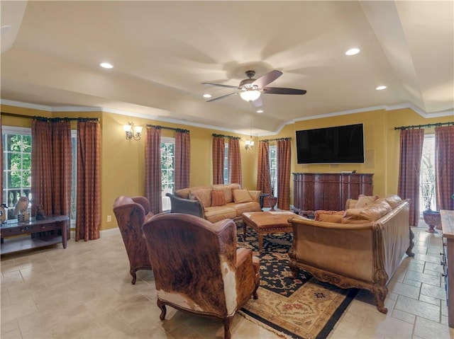 living room featuring a ceiling fan, baseboards, recessed lighting, ornamental molding, and stone tile flooring