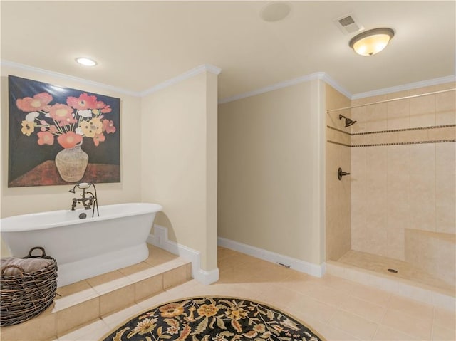 full bath with visible vents, tiled shower, a freestanding bath, tile patterned flooring, and ornamental molding