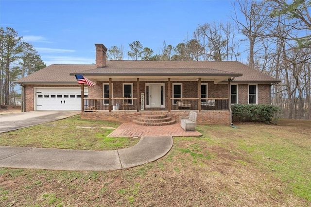 ranch-style home featuring covered porch, a garage, brick siding, driveway, and a chimney