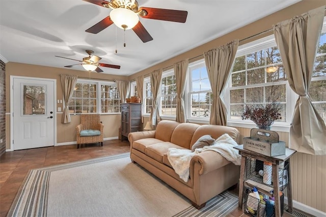 tiled living area featuring radiator and baseboards