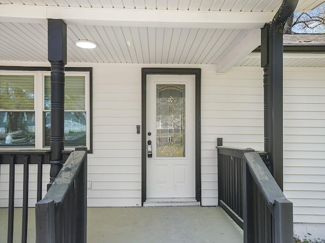 property entrance featuring covered porch