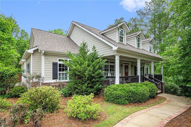 255 Heritage Creek Trl, Ball Ground, GA 30107 - view of front facade with roof with shingles and a porch